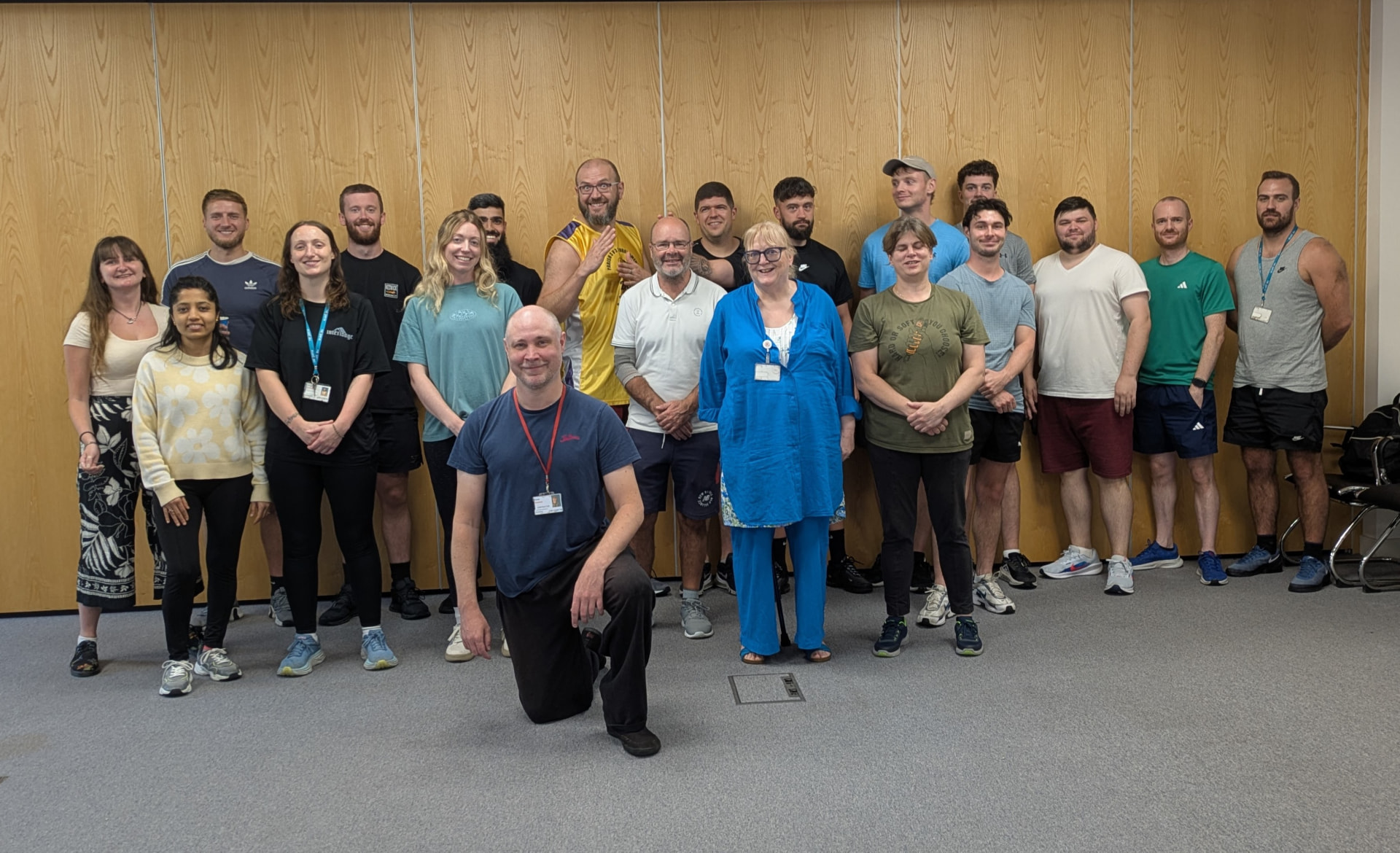 A large corporate team after an in-house Qigong session