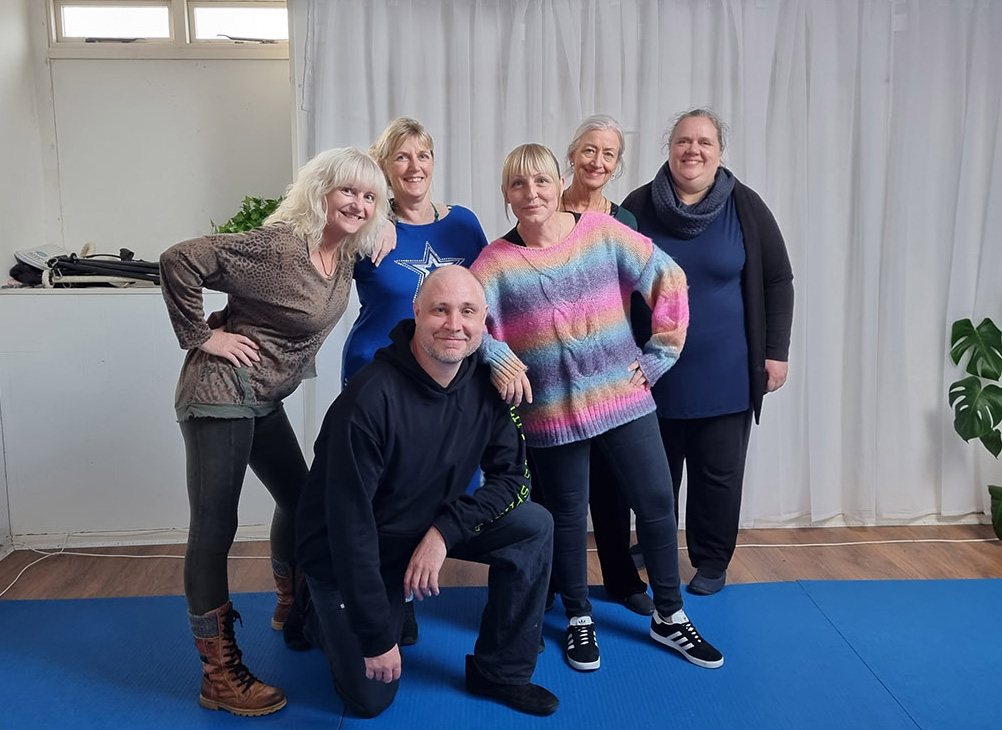 Chris with a small group of students after a Qigong retreat session